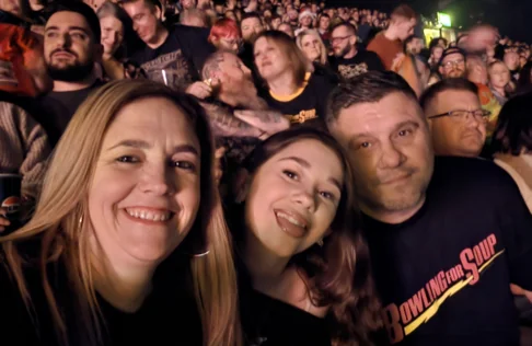 Concert fans selfie in crowd